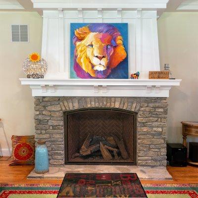 detail of stone fireplace and coffered ceiling terrace park